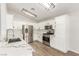 Updated kitchen featuring stainless steel appliances and stylish lighting at 5588 La Sendas Ct, Las Vegas, NV 89122