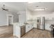 Bright kitchen features white cabinets, stainless steel appliances, and marble countertops at 5588 La Sendas Ct, Las Vegas, NV 89122