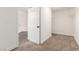 Spacious walk-in closet with shelving and carpeted floors, offering ample storage at 5588 La Sendas Ct, Las Vegas, NV 89122