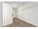 Bright walk-in closet featuring carpet, shelving, and ample storage space at 5588 La Sendas Ct, Las Vegas, NV 89122