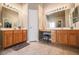 Bathroom featuring dual sinks, vanity, and tile flooring at 5844 Gushing Spring Ave, Las Vegas, NV 89131