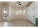 Dining area boasts tile flooring, backyard access and storage cabinets at 5844 Gushing Spring Ave, Las Vegas, NV 89131