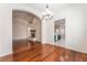 Open-concept dining room with hardwood floors and easy access to the kitchen at 5844 Gushing Spring Ave, Las Vegas, NV 89131