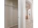 Hallway with a view into another room with stainless steel appliances at 5844 Gushing Spring Ave, Las Vegas, NV 89131