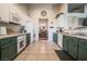Spacious kitchen with ample counter space and tile flooring at 5844 Gushing Spring Ave, Las Vegas, NV 89131
