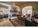 Inviting living room with a fireplace, stylish decor, and an open floor plan at 5844 Gushing Spring Ave, Las Vegas, NV 89131