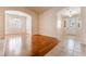 A living room with hardwood floors and an entry way to the front door at 5844 Gushing Spring Ave, Las Vegas, NV 89131