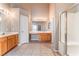 A spacious main bathroom featuring a vanity, mirror, and walk-in shower at 5844 Gushing Spring Ave, Las Vegas, NV 89131