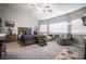 Large bedroom with ceiling fan, carpet and plenty of natural light at 5844 Gushing Spring Ave, Las Vegas, NV 89131