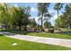 A beautiful park featuring palm trees, green grass, walkway, and a picnic area, perfect for relaxing outdoor activities at 5844 Gushing Spring Ave, Las Vegas, NV 89131