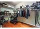 Spacious walk-in closet with wood flooring and lots of wire shelving and hanging rods at 5844 Gushing Spring Ave, Las Vegas, NV 89131