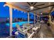 Charming covered patio overlooking a beautiful pool and outdoor area at 5852 Ireland Ridge Ct, Las Vegas, NV 89149