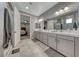 Elegant primary bathroom with double vanities and modern finishes at 600 Suncrest Peak Pl, Henderson, NV 89011