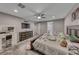 Spacious main bedroom offers ample space, soft carpet, and a bright ambiance at 600 Suncrest Peak Pl, Henderson, NV 89011
