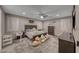 Relaxing bedroom with a ceiling fan, window shutters, and soft carpet for a cozy atmosphere at 600 Suncrest Peak Pl, Henderson, NV 89011