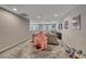 Bright and airy bonus room with soft carpet, neutral decor, and versatile layout at 600 Suncrest Peak Pl, Henderson, NV 89011