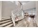 Spacious foyer with staircase and wood flooring at 600 Suncrest Peak Pl, Henderson, NV 89011