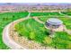 A vibrant park showcasing winding walking paths and a covered gazebo, perfect for enjoying the outdoors at 600 Suncrest Peak Pl, Henderson, NV 89011
