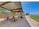 A shaded picnic area provides a perfect spot for community gatherings and outdoor dining at 600 Suncrest Peak Pl, Henderson, NV 89011