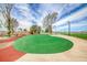 View of a play area with soft, textured green turf and landscaping at 600 Suncrest Peak Pl, Henderson, NV 89011
