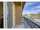 Balcony view shows the neighborhood with multiple homes and street at 6255 W Arby Ave # 118, Las Vegas, NV 89118
