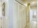 Bright hallway with a large closet and tile flooring at 6255 W Arby Ave # 118, Las Vegas, NV 89118