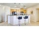 Modern kitchen boasts granite countertops, stainless steel appliances, and a convenient breakfast bar at 6255 W Arby Ave # 118, Las Vegas, NV 89118