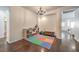 Large bonus room with wood flooring and lots of light, perfect for playroom at 6329 Sterling Ranch Way, North Las Vegas, NV 89081
