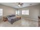 The main bedroom has lots of natural light, ceiling fan, and plenty of space at 6329 Sterling Ranch Way, North Las Vegas, NV 89081
