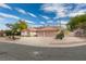 Charming single-story home with a well-manicured front yard and a three car garage at 6582 Cartgate Ct, Las Vegas, NV 89110