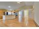 Bright living area with a kitchen island and hardwood flooring at 6582 Cartgate Ct, Las Vegas, NV 89110
