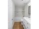 Bathroom features a white vanity and a tub shower at 6733 W Charleston Blvd # 3, Las Vegas, NV 89146