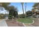 Manicured front yard with trimmed trees and bushes offers a peaceful approach to the home at 6733 W Charleston Blvd # 3, Las Vegas, NV 89146