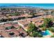 An elevated view of a Las Vegas neighborhood showcases the red-tiled roofs and mature landscaping at 6733 W Charleston Blvd # 3, Las Vegas, NV 89146