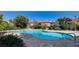 Beautiful community pool surrounded by lush landscaping, offering a serene outdoor space at 6733 W Charleston Blvd # 3, Las Vegas, NV 89146