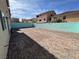 The backyard features a brick-paved patio and block wall at 6778 Goose Watch Ct, Las Vegas, NV 89139
