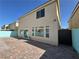 The backyard boasts a brick-paved patio and block wall at 6778 Goose Watch Ct, Las Vegas, NV 89139