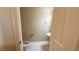 This bathroom features tile floors, cream colored walls, toilet, and pedestal sink at 6778 Goose Watch Ct, Las Vegas, NV 89139