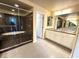 Stylish bathroom with glass shower enclosure and vanity area at 6778 Goose Watch Ct, Las Vegas, NV 89139