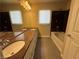 Bathroom features a dual sink vanity and a separate tub and shower at 6778 Goose Watch Ct, Las Vegas, NV 89139