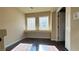 Sunny bedroom with tile flooring and natural light at 6778 Goose Watch Ct, Las Vegas, NV 89139