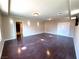 Open living room featuring modern lighting and wood-look flooring at 6778 Goose Watch Ct, Las Vegas, NV 89139