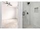Modern bathroom features a glass shower with sleek fixtures and patterned tile at 6868 Sky Pointe Dr # 1122, Las Vegas, NV 89131