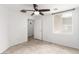Bright bedroom features a ceiling fan and a window at 6868 Sky Pointe Dr # 1122, Las Vegas, NV 89131