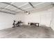Spacious garage features high ceilings and ample storage at 6868 Sky Pointe Dr # 1122, Las Vegas, NV 89131