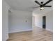 Bright and airy living room with hardwood floors and neutral paint at 709 Rossmoyne Ave, North Las Vegas, NV 89030