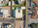 Expansive aerial view of a modern home featuring a pool, basketball court, and contemporary design at 7385 Heron Canyon Ct, Las Vegas, NV 89117