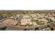 Aerial view of a modern luxury neighborhood, displaying the unique architectural designs and community layout at 7385 Heron Canyon Ct, Las Vegas, NV 89117