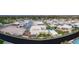 Panoramic aerial view of the upscale residential neighborhood, showcasing modern homes, manicured landscaping, and community pool at 7385 Heron Canyon Ct, Las Vegas, NV 89117