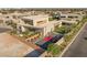Aerial view highlighting the home's distinct architecture with a basketball court and modern landscaping at 7385 Heron Canyon Ct, Las Vegas, NV 89117